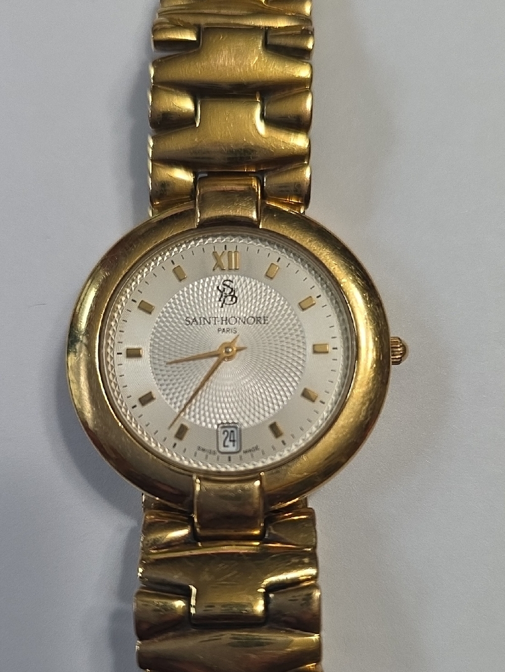 SAINT HONORE 18kt GP case 14kt GP Band. Round Bracelet Watch with White Dial